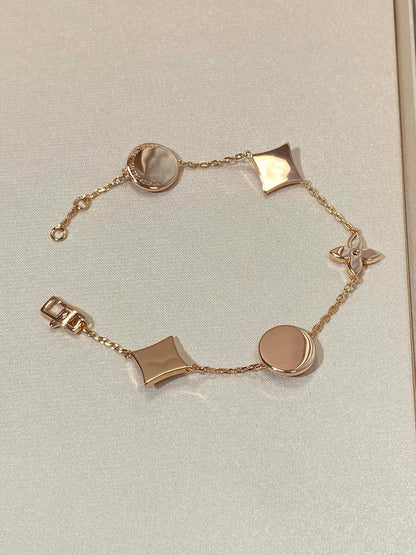 [Amore Jewels]STAR AND SUN 5 MOTIF MOP PINK GOLD BRACELET